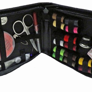 May include: A black zippered travel sewing kit with a variety of sewing supplies, including needles, thread, scissors, and a tape measure.