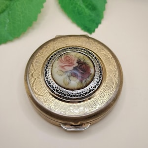 Stratton Pill Box, engine turned design with ceramic rose cabochon, England