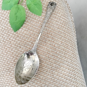 Ornate Tablespoon with embossed handle, etched rural scene with bird detail