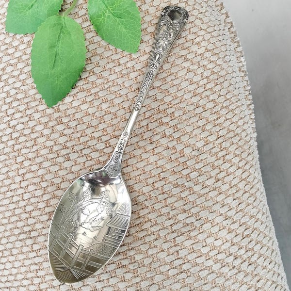 Ornate Tablespoon with embossed handle, etched rural scene with bird detail