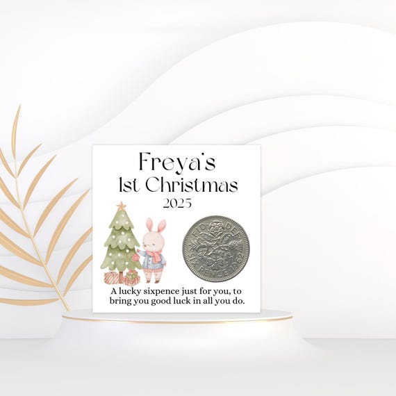 A hand-finished lucky sixpence coin packaged as a personalised baby's first Christmas keepsake — a charming old-world British tradition most people have never heard of.