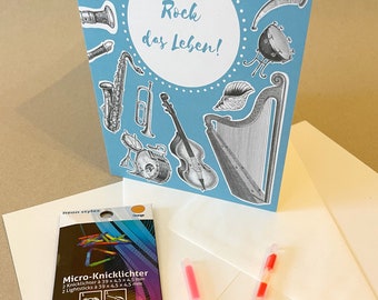 Off to the concert! Folding card with 2 micro glow sticks and envelope