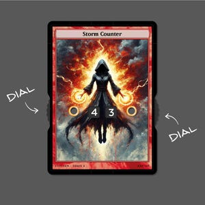 May include: A red and black card with the text "Storm Counter" and a picture of a person in a black robe with their arms outstretched, surrounded by orange and yellow lightning. The card has two dials with the numbers 4 and 3.