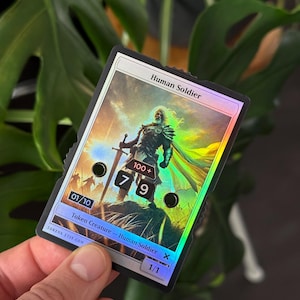 Serialized (X/10) Foil Human Soldier Token with Number-Display (0-999) – Magic the Gathering
