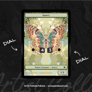 Könnte beinhalten: Digitale Kunstkarte mit einer Schmetterlingsillustration in Türkis, Orange und Braun. Die Karte trägt die Bezeichnung "Insekt" und hat Zifferblätter für das Spiel. Der Text "Token Creature - Insect" ist ebenfalls vorhanden.