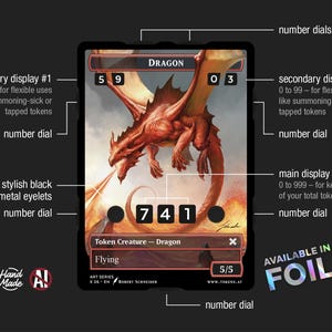 May include: A fantasy-themed card featuring a red dragon with a fiery background. The card includes number dials, a main display, and secondary displays for tracking game elements. The text "DRAGON" and "Flying" are visible. The card is available in foil.
