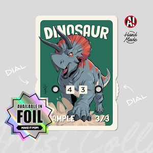 May include: A rectangular game card featuring a blue and red triceratops illustration with the text DINOSAUR at the top. The card includes two circular dials with the numbers 4 and 3 visible in white boxes, and a holographic star-shaped sticker.