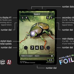 May include: A black card featuring a detailed illustration of a metallic green insect. The card includes number dials, a main display, and secondary displays for tracking tokens. Text on the card reads "Insect" and "Token Creature - Insect."