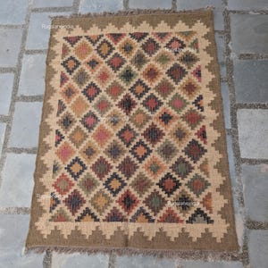 Jute Rug, Indoor Jute Rug, Wool Jute Kilim For Hallway Jute Rug Large Jute Rug, Kilim Area Rug, 8x10 Jute Rug

Handmade Navajo Kilim Rug, Aztec Rug, Accent Rug, Outdoor Rug/Indoor Rug, Living/Dinning Room 4X6 Ft. Wool Jute Kilim Rug, Indian DhurrieRug 
Jute Rug 8x10, Handwoven Jute Rug, Jute Area Rug, Flatweave Kilim Rug, 8x10 Kilim Rug, Bohemian Rug 9x12, 9x12 Wool Rug, Wool Kilim Rug

Jute Area Rug 8x10, Floral Jute Rug, Indian Traditional Jute Kilim 12x15 Large Kilim Rug, Bedroom Jute Rug