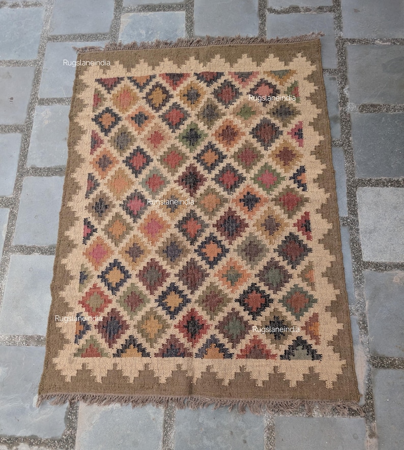Jute Rug, Indoor Jute Rug, Wool Jute Kilim For Hallway Jute Rug Large Jute Rug, Kilim Area Rug, 8x10 Jute Rug

Handmade Navajo Kilim Rug, Aztec Rug, Accent Rug, Outdoor Rug/Indoor Rug, Living/Dinning Room 4X6 Ft. Wool Jute Kilim Rug, Indian DhurrieRug 
Jute Rug 8x10, Handwoven Jute Rug, Jute Area Rug, Flatweave Kilim Rug, 8x10 Kilim Rug, Bohemian Rug 9x12, 9x12 Wool Rug, Wool Kilim Rug

Jute Area Rug 8x10, Floral Jute Rug, Indian Traditional Jute Kilim 12x15 Large Kilim Rug, Bedroom Jute Rug