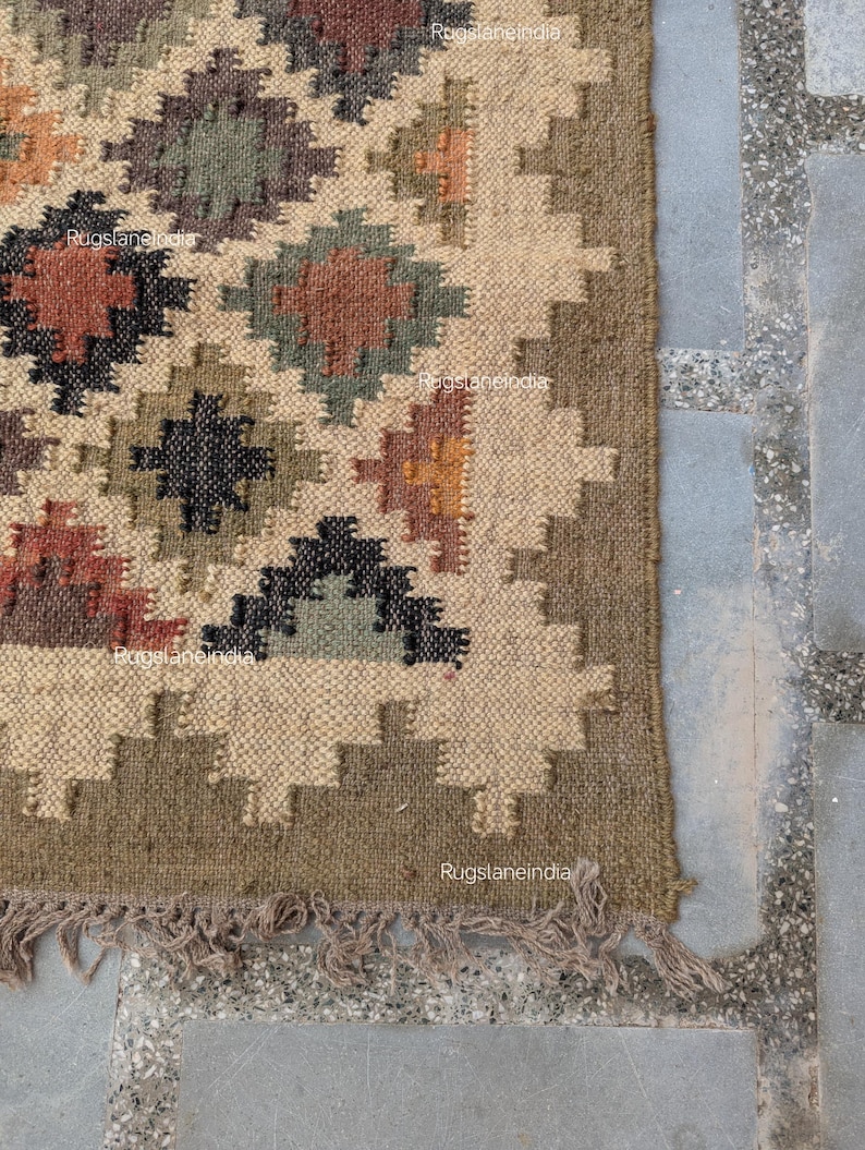 Jute Rug, Indoor Jute Rug, Wool Jute Kilim For Hallway Jute Rug Large Jute Rug, Kilim Area Rug, 8x10 Jute Rug

Handmade Navajo Kilim Rug, Aztec Rug, Accent Rug, Outdoor Rug/Indoor Rug, Living/Dinning Room 4X6 Ft. Wool Jute Kilim Rug, Indian DhurrieRug 
Jute Rug 8x10, Handwoven Jute Rug, Jute Area Rug, Flatweave Kilim Rug, 8x10 Kilim Rug, Bohemian Rug 9x12, 9x12 Wool Rug, Wool Kilim Rug

Jute Area Rug 8x10, Floral Jute Rug, Indian Traditional Jute Kilim 12x15 Large Kilim Rug, Bedroom Jute Rug