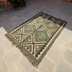 Wool Jute Kilim 9x12, Wool Kilim 8x10, Livingroom Area Rug 9x12, Hallway Area Rug 9x12, Wool Turkish Rug, Jute Area Rug 9x12 Jute Bedroom Rug, Flatweave Jute Rug, Kilim Area Rug, Jute Rug 9x12, Jute Area Rug

Jute Area Rug 9x12, Jute Bedroom Kilim, Wool Jute Rug 9x12 Jute Rug, Indoor Jute Rug, Wool Jute Kilim For Hallway Jute Rug Large Jute Rug, Kilim Area Rug, 8x10 Jute Rug

Kilim green Rug, Accent Rug, Outdoor Rug/Indoor Rug, Living/Dinning Room 4X6 Ft. Wool Jute Kilim Rug, Indian DhurrieRug