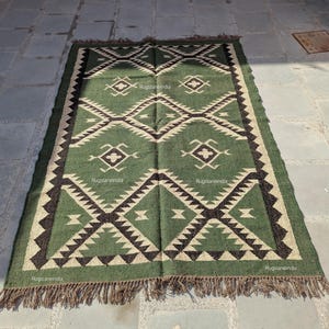 Wool Jute Kilim 9x12, Wool Kilim 8x10, Livingroom Area Rug 9x12, Hallway Area Rug 9x12, Wool Turkish Rug, Jute Area Rug 9x12 Jute Bedroom Rug, Flatweave Jute Rug, Kilim Area Rug, Jute Rug 9x12, Jute Area Rug

Jute Area Rug 9x12, Jute Bedroom Kilim, Wool Jute Rug 9x12 Jute Rug, Indoor Jute Rug, Wool Jute Kilim For Hallway Jute Rug Large Jute Rug, Kilim Area Rug, 8x10 Jute Rug

Kilim green Rug, Accent Rug, Outdoor Rug/Indoor Rug, Living/Dinning Room 4X6 Ft. Wool Jute Kilim Rug, Indian DhurrieRug