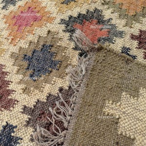 Jute Rug, Indoor Jute Rug, Wool Jute Kilim For Hallway Jute Rug Large Jute Rug, Kilim Area Rug, 8x10 Jute Rug

Handmade Navajo Kilim Rug, Aztec Rug, Accent Rug, Outdoor Rug/Indoor Rug, Living/Dinning Room 4X6 Ft. Wool Jute Kilim Rug, Indian DhurrieRug 
Jute Rug 8x10, Handwoven Jute Rug, Jute Area Rug, Flatweave Kilim Rug, 8x10 Kilim Rug, Bohemian Rug 9x12, 9x12 Wool Rug, Wool Kilim Rug

Jute Area Rug 8x10, Floral Jute Rug, Indian Traditional Jute Kilim 12x15 Large Kilim Rug, Bedroom Jute Rug