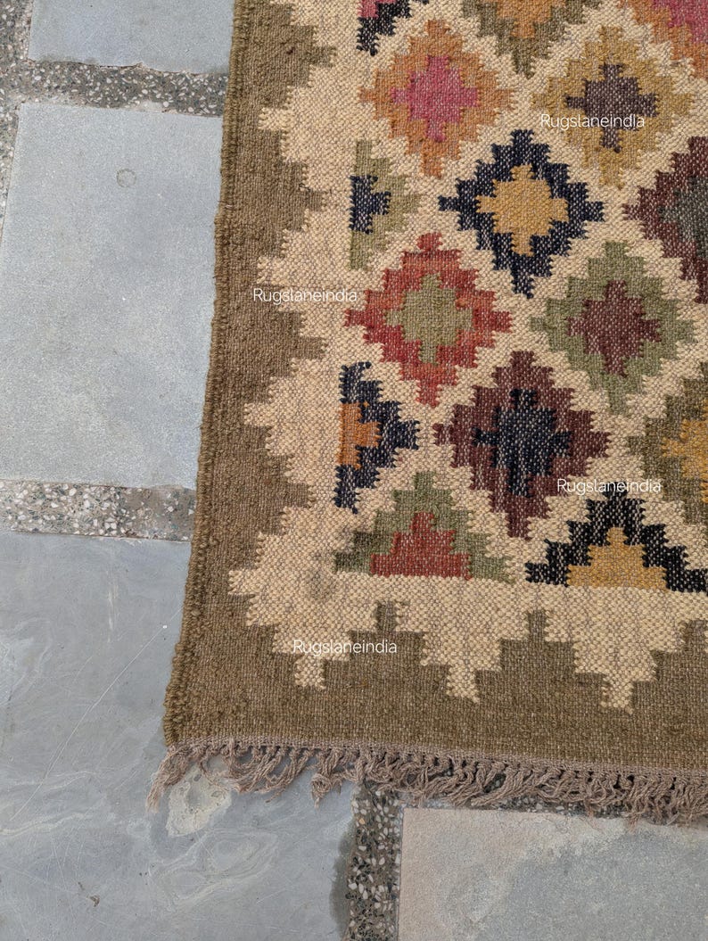 Jute Rug, Indoor Jute Rug, Wool Jute Kilim For Hallway Jute Rug Large Jute Rug, Kilim Area Rug, 8x10 Jute Rug

Handmade Navajo Kilim Rug, Aztec Rug, Accent Rug, Outdoor Rug/Indoor Rug, Living/Dinning Room 4X6 Ft. Wool Jute Kilim Rug, Indian DhurrieRug 
Jute Rug 8x10, Handwoven Jute Rug, Jute Area Rug, Flatweave Kilim Rug, 8x10 Kilim Rug, Bohemian Rug 9x12, 9x12 Wool Rug, Wool Kilim Rug

Jute Area Rug 8x10, Floral Jute Rug, Indian Traditional Jute Kilim 12x15 Large Kilim Rug, Bedroom Jute Rug