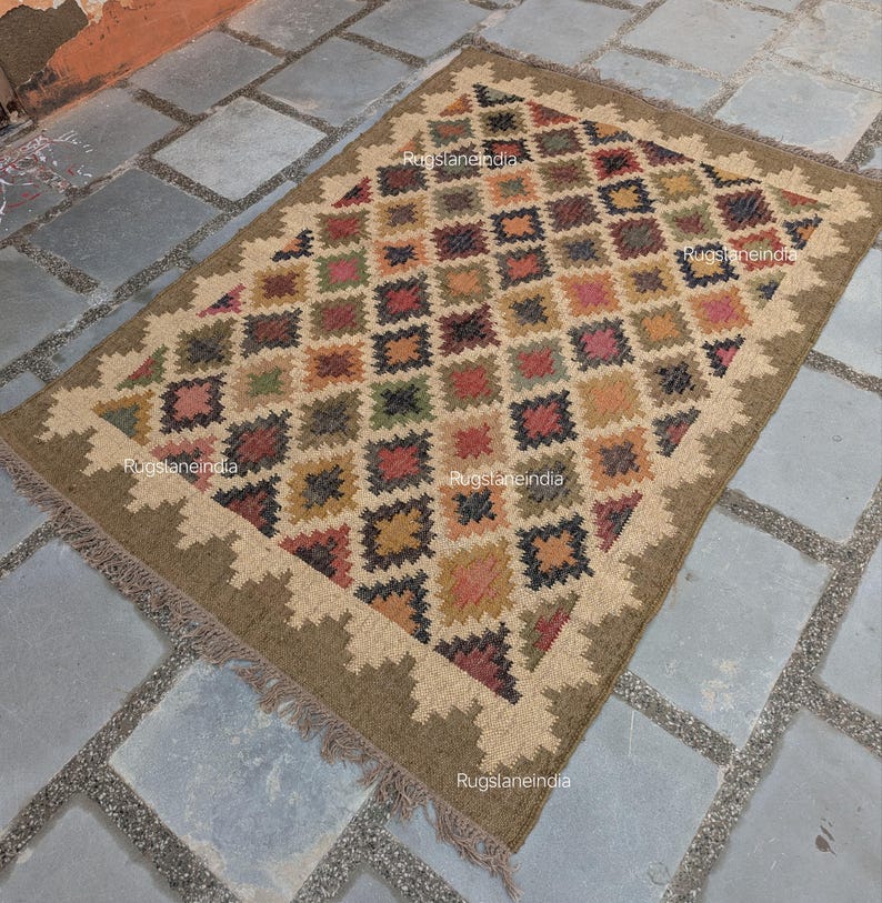 Jute Rug, Indoor Jute Rug, Wool Jute Kilim For Hallway Jute Rug Large Jute Rug, Kilim Area Rug, 8x10 Jute Rug

Handmade Navajo Kilim Rug, Aztec Rug, Accent Rug, Outdoor Rug/Indoor Rug, Living/Dinning Room 4X6 Ft. Wool Jute Kilim Rug, Indian DhurrieRug 
Jute Rug 8x10, Handwoven Jute Rug, Jute Area Rug, Flatweave Kilim Rug, 8x10 Kilim Rug, Bohemian Rug 9x12, 9x12 Wool Rug, Wool Kilim Rug

Jute Area Rug 8x10, Floral Jute Rug, Indian Traditional Jute Kilim 12x15 Large Kilim Rug, Bedroom Jute Rug