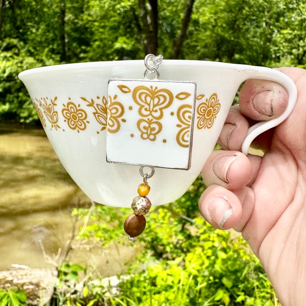 Handmade and repurposed using a vintage 1970s Correlle “Butterfly Gold” salad plate square silver pendant necklace