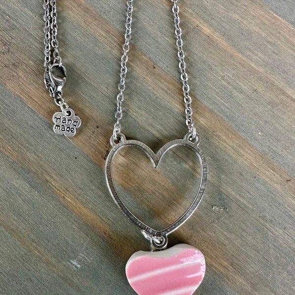 Beautiful broken china pendant necklace using a vintage Pink Fiestaware plate, on silver necklace