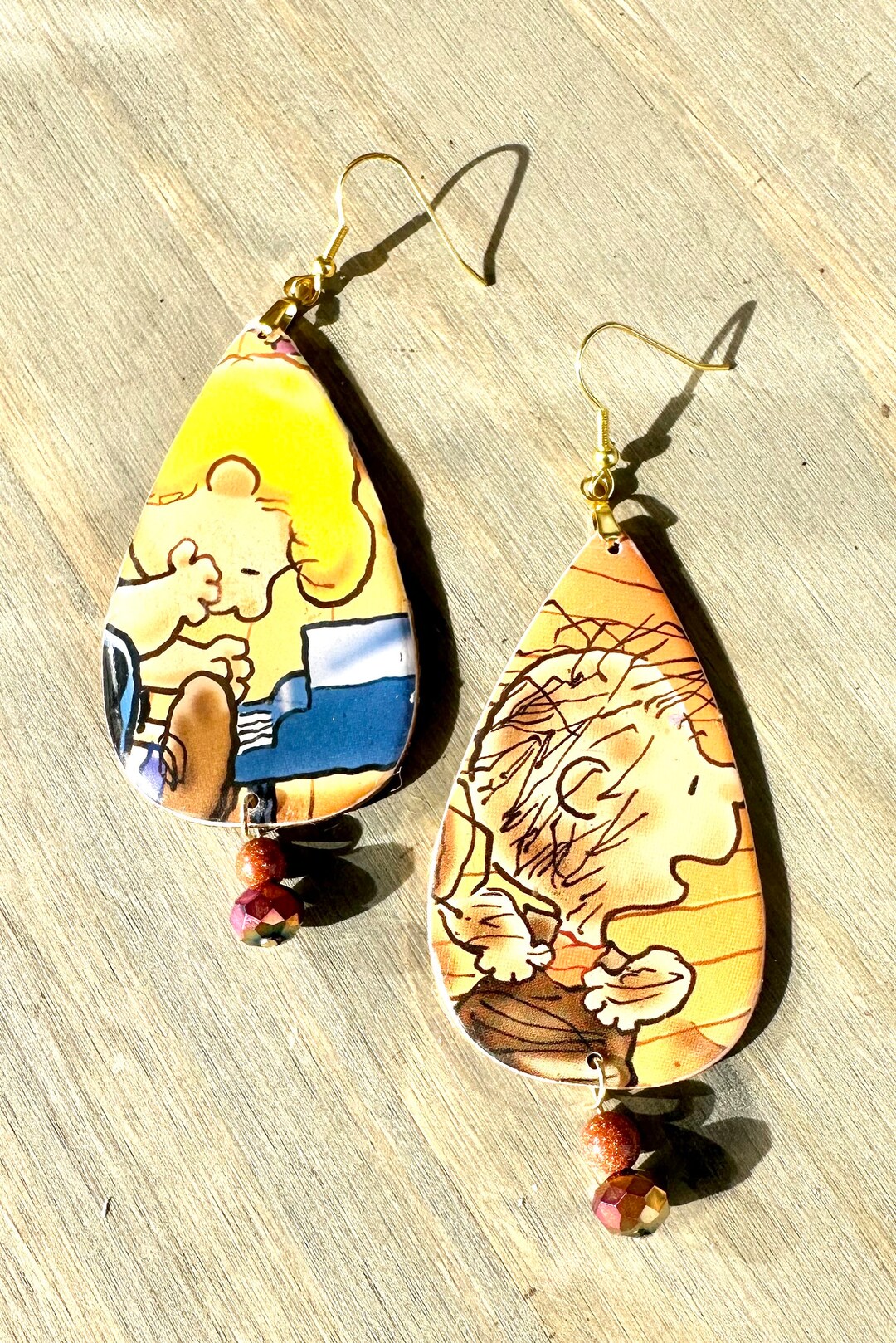 A Charlie Brown Christmas Earrings Made From Images From Vintage Book