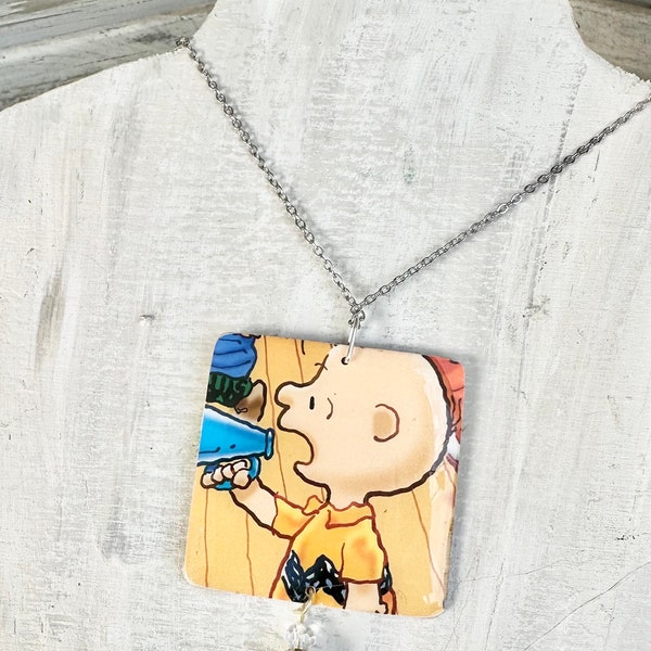 A Charlie Brown Christmas Necklace made from image from vintage book, Charlie the director