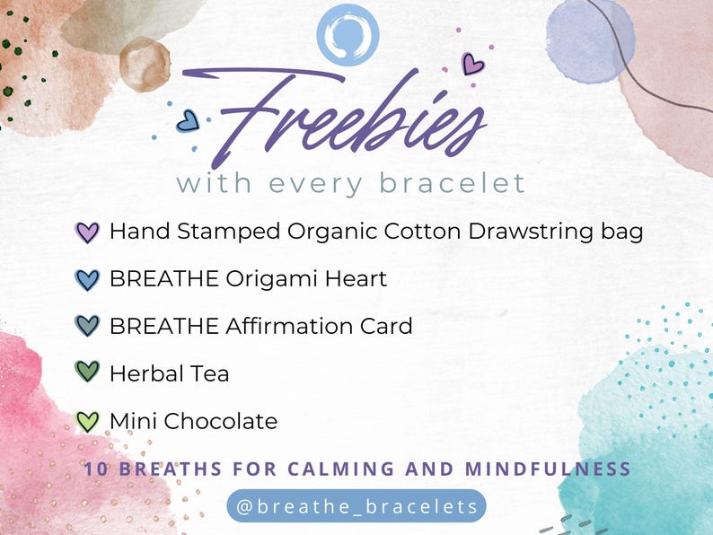 May include: Promotional graphic with the word "Freebies" in purple script, listing items included with a bracelet purchase. Items include a drawstring bag, origami heart, affirmation card, herbal tea, and mini chocolate. The text also includes the phrase "10 BREATHS FOR CALMING AND MINDFULNESS" and an Instagram handle.