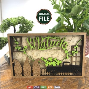May include: A digital file for a laser cut wooden craft project featuring a truck, gnomes, and shamrocks with the text "Happy St. Patrick's Day".