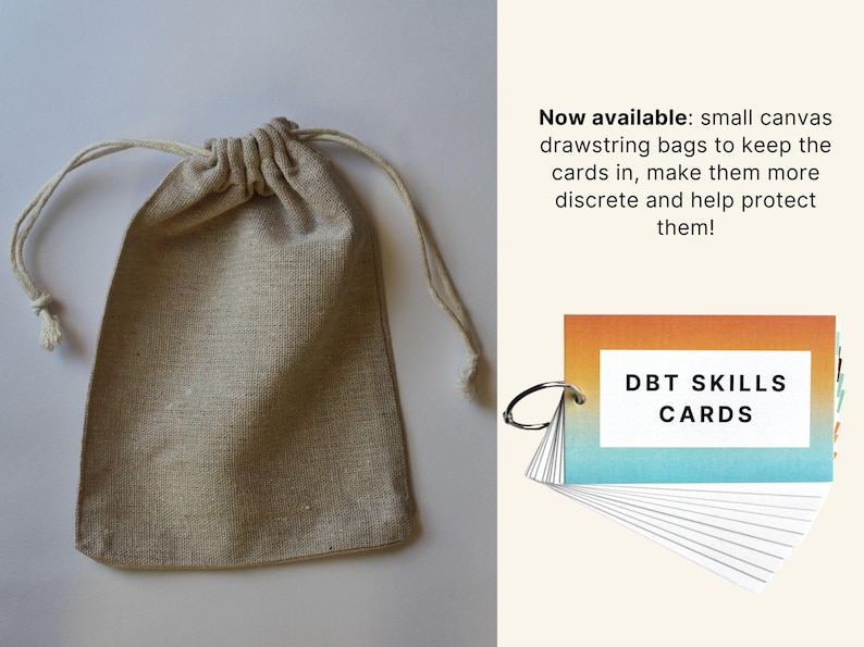 May include: A natural canvas drawstring bag with a light beige color. The bag is filled with a set of DBT Skills Cards. The cards have a gradient design with orange, yellow, and blue colors. The text "DBT SKILLS CARDS" is printed in black on the cards.