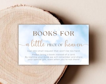 May include: A rectangular card with the text "BOOKS FOR a little PIECE OF heaven" in brown and blue. The card has a watercolor-style blue background and includes a request for guests to bring a book instead of a card.