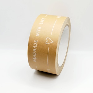 May include: A roll of brown paper tape with the text "HANDMADE WITH LOVE" and a heart printed in white.