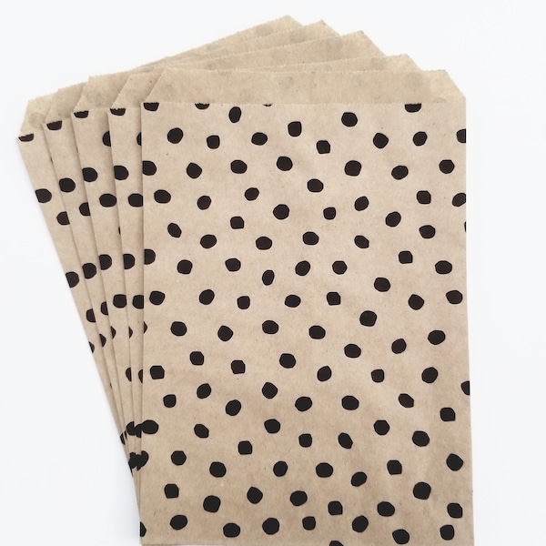 Bolsas de papel marrón con lunares, bolsas kraft ecológicas recicladas. Estampado de lunares.