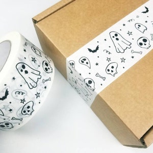 Halloween eco-friendly packaging tape | Self adhesive 50m long | Ghosts, bats and skulls | Recyclable spooky box sealing white paper