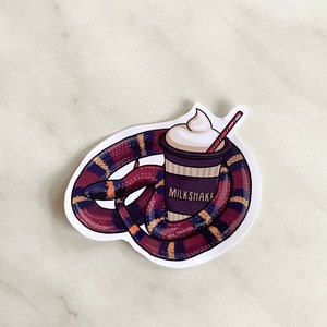 Milk snake holding milkshake glossy sticker
