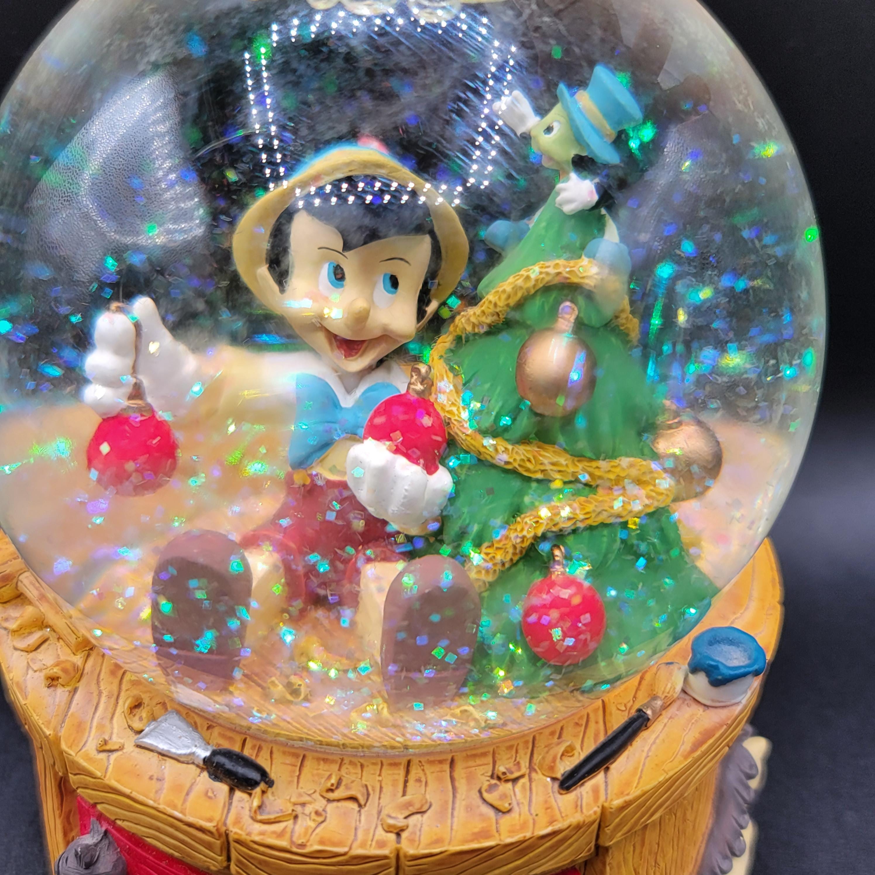 Enesco Disney Pinocchio Snow Globe Deck the Halls Christmas