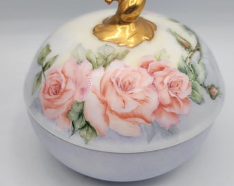 Recipiente para el cabello de porcelana antigua HH Kaiser Alemania con tapa floral