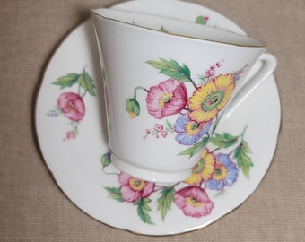 Taza de té y platillo florales vintage de porcelana china