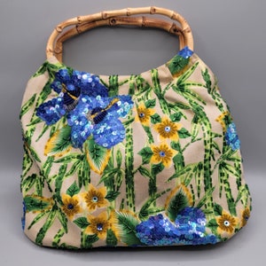 Bolso de mano con cuentas y asa de bambú de Enzo Angiolini