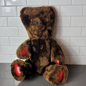 Vintage gelede bruine teddybeer knuffel