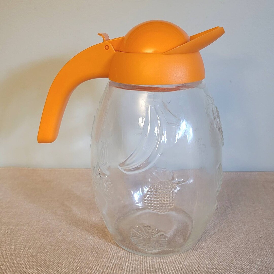 Glass Juice Pitcher With Orangr Lid and Handle Embossed Fruit Vintage