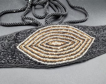 Cintura vintage in corda con perline e paillettes, tonalità oro nero