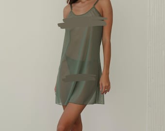 May include: A sheer, sage green slip dress with thin straps.