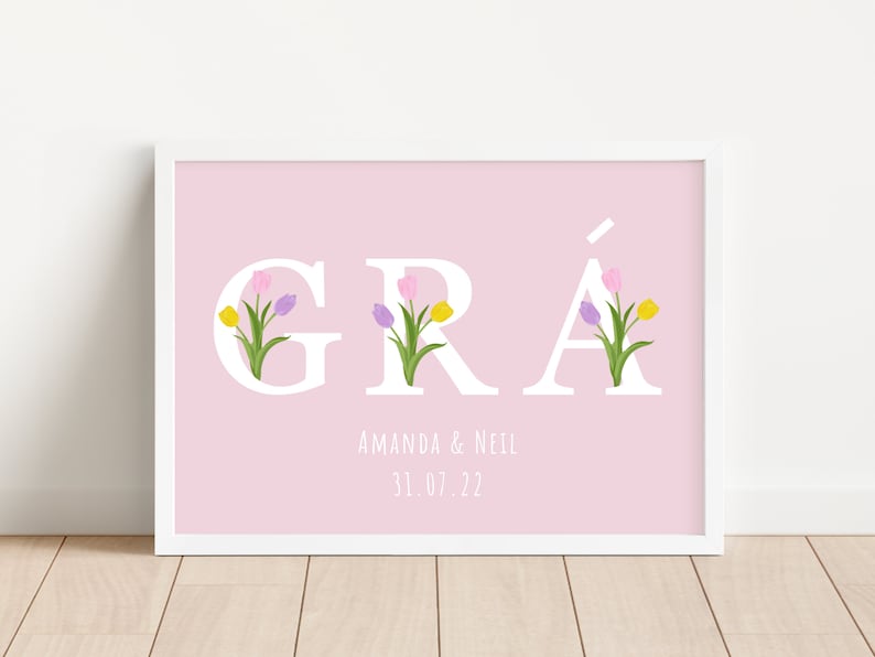 May include: A pink printable art print with the word "GR&Aacute;" in white letters with colourful tulips in the letters. The text "Amanda & Neil 31.07.22" is below the word.