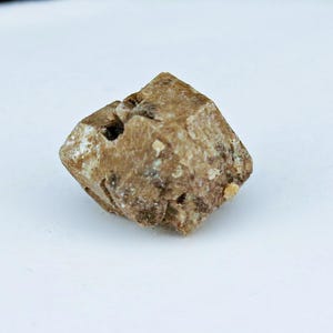 CATAPLEIITE PSEUDOMORPH after sodalite,  Poudrette Quarry, MSH, Mont St. Hilaire, Quebec Canada, Mineral Specimen. Symmetry Minerals