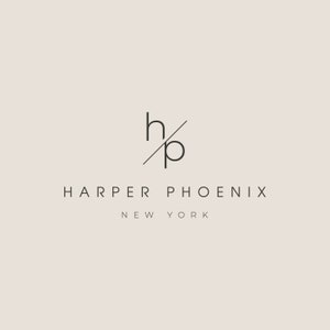 May include: Black and white logo with the letters "hp" intertwined and a diagonal line through them. The text "HARPER PHOENIX NEW YORK" is below the logo.
