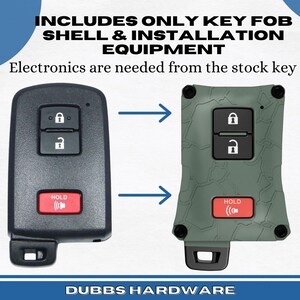 May include: A comparison of a black key fob and a green camouflage key fob shell. The black key fob has two buttons and a red "HOLD" button. The green shell has the same button layout. Text on the image reads "INCLUDES ONLY KEY FOB SHELL & INSTALLATION EQUIPMENT".