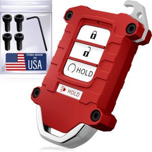 May include: A red key fob case with silver accents and a hook. The case has three white buttons with lock, unlock, and hold symbols. A small bag contains screws, and a wrench, with a "Fobs Made in USA" sticker.