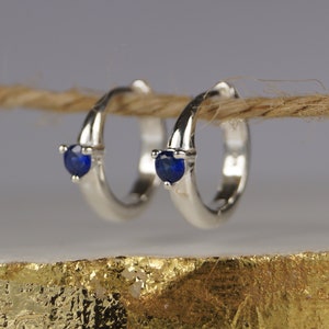 Blue Sapphire Hoop Earrings, Sterling Silver Huggie Earrings, September Sapphire Earrings, Blue Cubic Zirconia.