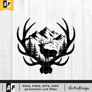 May include: Black and white silhouette of a deer standing in a mountain landscape with trees. The deer is framed by a set of antlers.