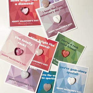May include: A set of Valentine's Day cards with different gemstone heart designs and messages. The cards feature pink, green, blue, and white backgrounds with geometric patterns. The messages include "you totally rock!" and "you're gem-uiney special!"