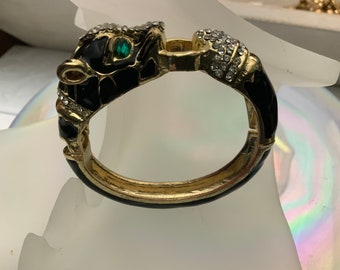 Vintage Panther Gold Tone Clamper Bracelet with Black Enamel, Clear Crystals and Green Crystal Eyes (Unsigned)