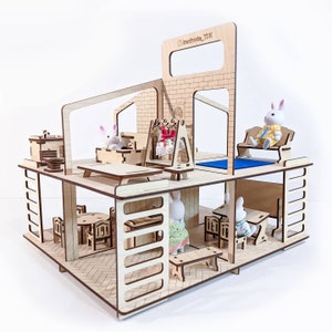 Digital file of a dollhouse with furniture for laser cutting.